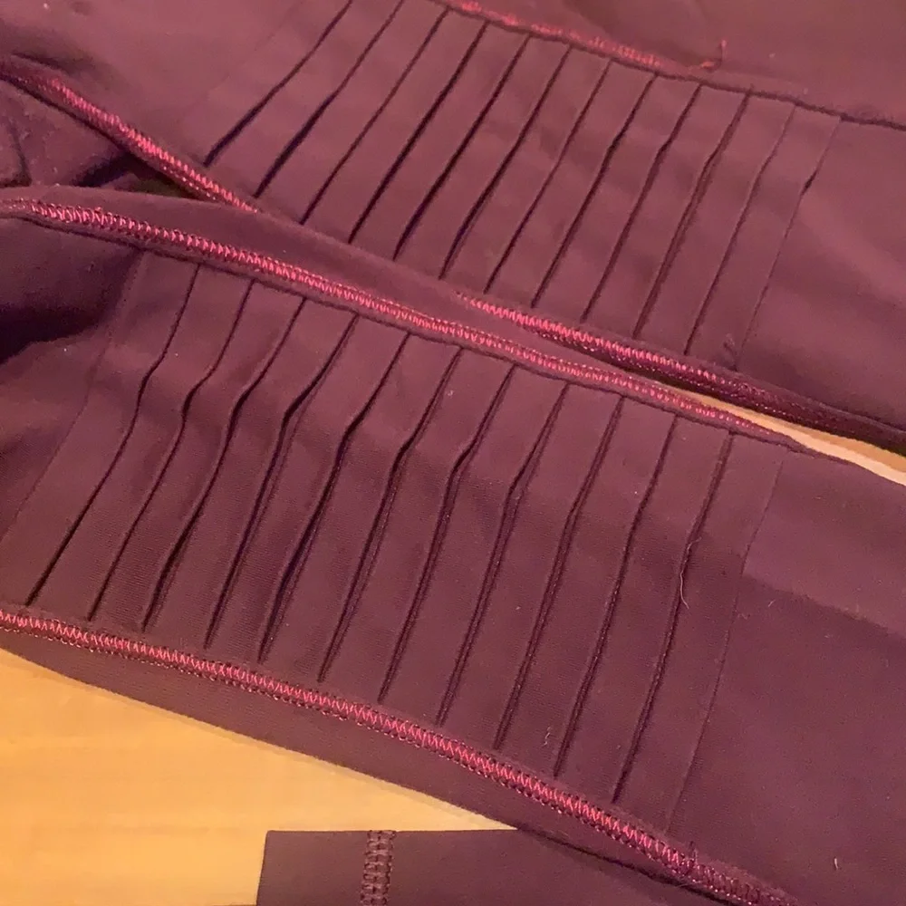 Gently worn Lululemon plum leggings with pressed pleats - Picture 2 of 4